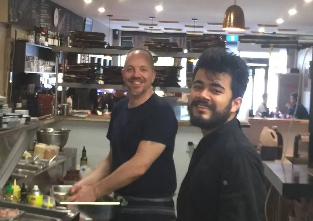 Why is a café important to a community?